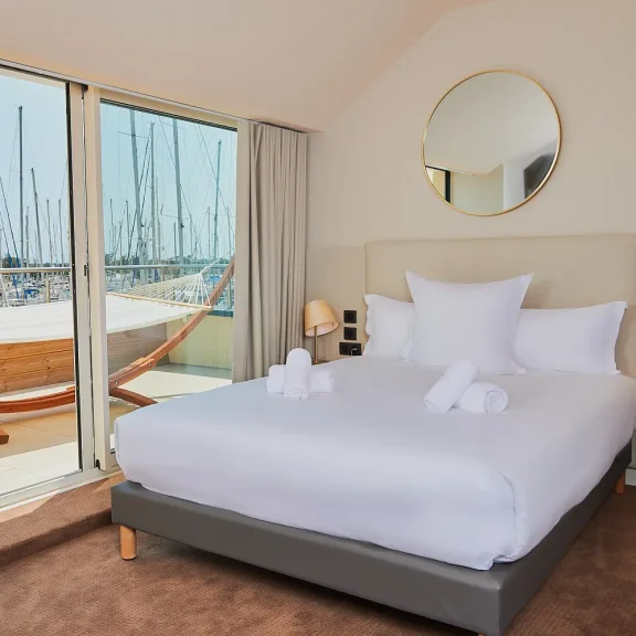 Les Trois Voiles Hotel Deluxe room with port view